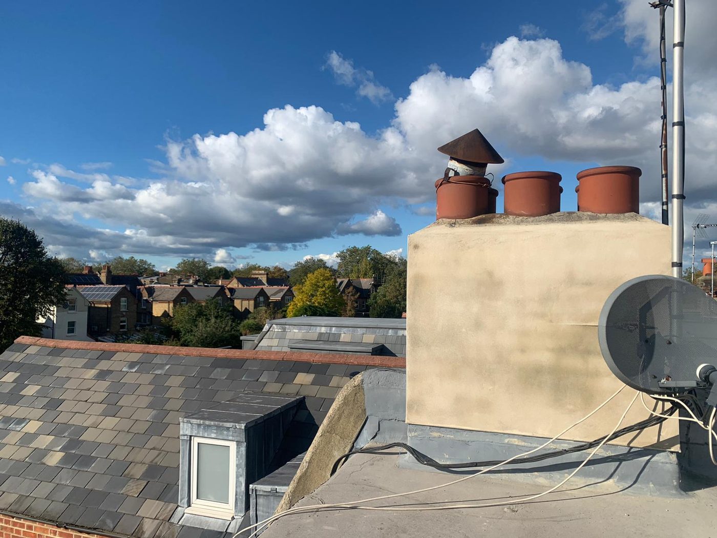 Rebuilt and rendered chimney stack by Redline Roofing