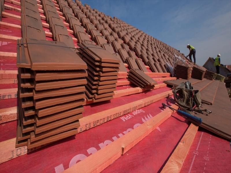 New roof installation in progress by Redline Roofing